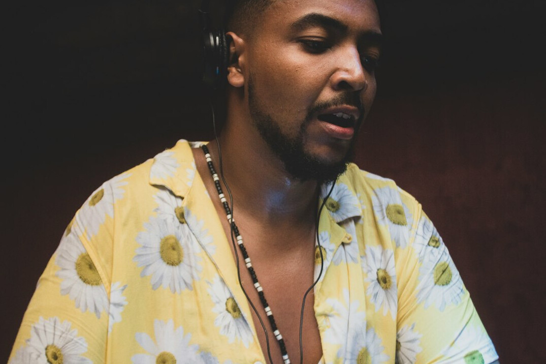 Studio portrait of a Black Brazilian man with short beard in a shirt